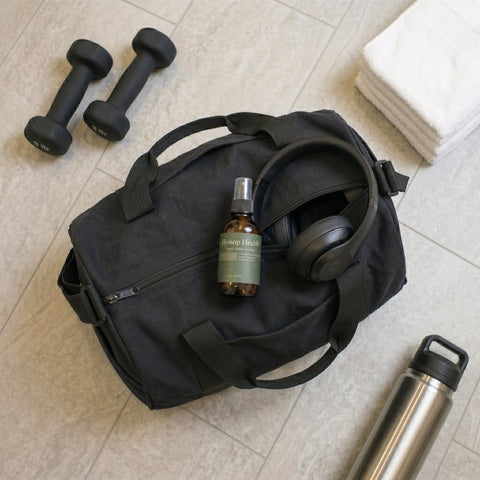 Hyssop Health Oregano Oil displayed at the gym as part of a clean wellness routine